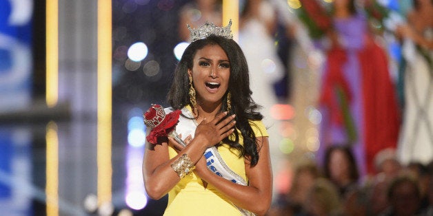 ATLANTIC CITY, NJ - SEPTEMBER 15: Miss America 2014 contestant Miss New York Nina Davuluri wins the 2014 Miss America Competition at Boardwalk Hall Arena on September 15, 2013 in Atlantic City, New Jersey. (Photo by Michael Loccisano/Getty Images)