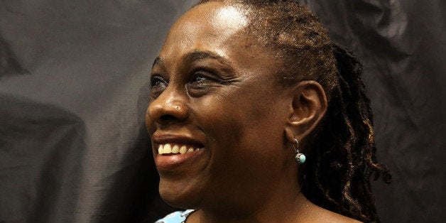 NEW YORK, NY - SEPTEMBER 10: Wife of public advocate and mayoral candidate Bill de Blasio, Chirlane McCray, emerges from a voting booth after voting in the New York City mayoral primary on September 10, 2013 in the Brooklyn borough of New York City. In recent polls by Quinnipiac University, de Blasio is now close to the 40 percent threshold he'd need to avoid a runoff in the Democratic primary. (Photo by Spencer Platt/Getty Images)