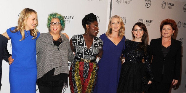 NEW YORK, NY - OCTOBER 02: The Cast/Crew of Orange Is the New Black: (L-R) Natasha Lyonne, Jason Biggs, Taylor Schilling, cretor Jenji Kohan, Danielle Brooks, screenwriter Piper Kerman, Taryn Manning and Kate Mulgrew attend 'Orange Is the New Black' during 2013 PaleyFest: Made In New York at The Paley Center for Media on October 2, 2013 in New York City. (Photo by Craig Barritt/Getty Images)