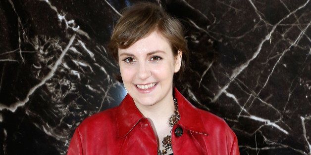 PARIS, FRANCE - OCTOBER 02: Lena Dunham attends the Miu Miu show as part of the Paris Fashion Week Womenswear Spring/Summer 2014 at the Palais dIENA on October 2, 2013 in Paris, France. (Photo by Bertrand Rindoff Petroff/Getty Images)