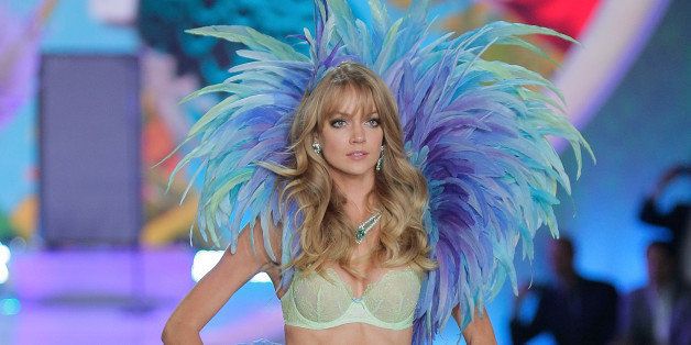 NEW YORK, NY - NOVEMBER 13: Lindsay Ellingson walks in the 2013 Victoria's Secret Fashion Show at Lexington Avenue Armory on November 13, 2013 in New York City. (Photo by Randy Brooke/WireImage)