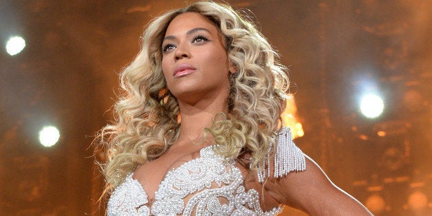 LOS ANGELES, CA - DECEMBER 03: Entertainer Beyonce performs on stage during 'The Mrs. Carter Show World Tour' at the Staples Center on December 3, 2013 in Los Angeles, California. (Photo by Larry Busacca/PW/WireImage for Parkwood Entertainment)