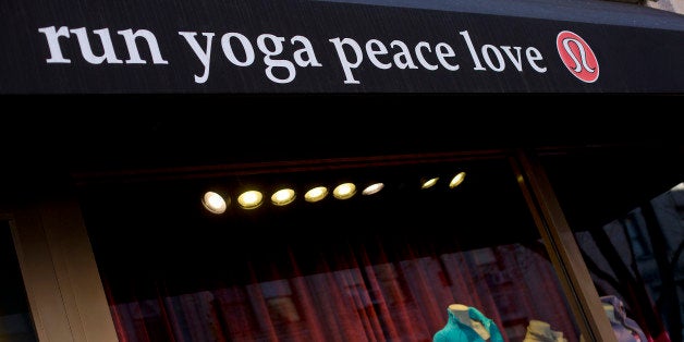 Workout clothes are displayed for sale in the window of a Lululemon Athletica Inc. store on Madison Avenue in New York, U.S., on Thursday, Dec. 12, 2013. Lululemon Athletica Inc., the yogawear retailer that named a new chief executive officer this week, fell the most in six months after forecasting quarterly profit that trailed analysts estimates amid product delays. Photographer: Victor J. Blue/Bloomberg via Getty Images