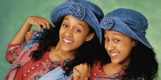 UNITED STATES - OCTOBER 06: SISTER, SISTER - Gallery - Season One - 10/6/1993, Separated at birth, twin girls Tia and Tamera (Tia, left, and Tamera Mowry), unexpectedly encounter each other in a clothing store and conspire to run away together to Minneapolis-St. Paul, the ' twin cities'. The plan is discovered by their adoptive parents, who agree to share Ray's house despite their strong mutual dislike. , (Photo by ABC Photo Archives/ABC via Getty Images)