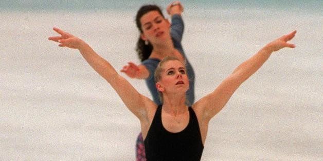 HAMAR, NORWAY: Tonya Harding (front) of the United States and compatriot Nancy Kerrigan skate during a practice session 22 February 1994 in Hamar, near Lillehammer, at the XVIIth Winter Olympic Games, on the eve of the start of the ladies' competition. AFP PHOTO/ERIC FEFERBERG (Photo credit should read ERIC FEFERBERG/AFP/Getty Images)