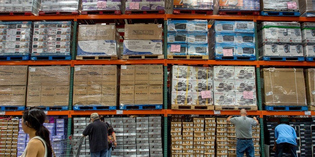 Customers shop at a Costco Wholesale Corp. store in Hackensack, New Jersey, U.S., on Wednesday, Sept. 11, 2013. The U.S. Census Bureau is scheduled to release business inventories data on Sept. 13. Photographer: Ron Antonelli/Bloomberg via Getty Images