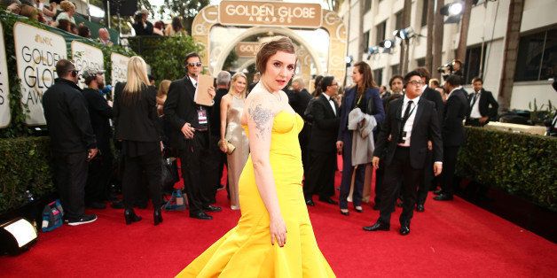 BEVERLY HILLS, CA - JANUARY 12: 71st ANNUAL GOLDEN GLOBE AWARDS -- Pictured: Actress/director Lena Dunham arrives to the 71st Annual Golden Globe Awards held at the Beverly Hilton Hotel on January 12, 2014 -- (Photo by Christopher Polk/NBC/NBC via Getty Images)
