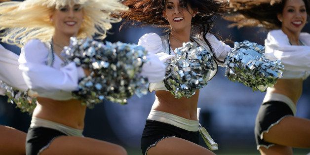 OAKLAND, CA - NOVEMBER 24: The Oakland Raiders Cheerleaders 'The Raiderettes' performs during a game against the Tennessee Titans at O.co Coliseum on November 24, 2013 in Oakland, California. (Photo by Thearon W. Henderson/Getty Images)