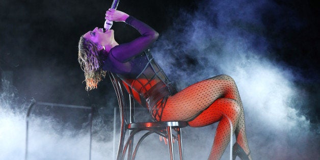 LOS ANGELES, CA - JANUARY 26: Beyonce Knowles performs onstage during the 56th GRAMMY Awards held at Staples Center on January 26, 2014 in Los Angeles, California. (Photo by Michael Tran/FilmMagic)