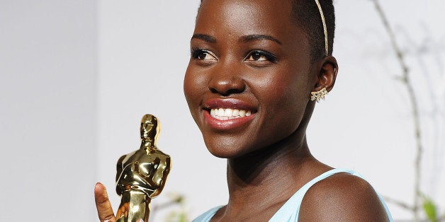 HOLLYWOOD, CA - MARCH 02: Actress Lupita Nyong'o poses in the press room at the 86th annual Academy Awards at Dolby Theatre on March 2, 2014 in Hollywood, California. (Photo by Jason LaVeris/WireImage)