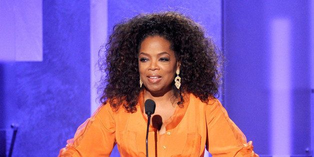 PASADENA, CA - FEBRUARY 22: Oprah Winfrey speaks onstage during the 45th NAACP Image Awards presented by TV One at Pasadena Civic Auditorium on February 22, 2014 in Pasadena, California. (Photo by Kevin Winter/Getty Images for NAACP Image Awards)