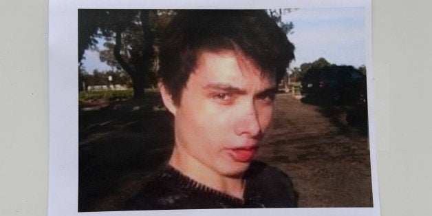 An undated photo of murder suspect Elliot Rodger is seen at a press conference by the Santa Barbara County Sheriff in Goleta, California May 24, 2014. Rodger, 22, went on a rampage in Isla Vista near the University of California at Santa Barbara campus, stabbed three people to death at his apartment before shooting to death three more in a terrorizing crime spree through the neighborhood. AFP PHOTO / ROBYN BECK (Photo credit should read ROBYN BECK/AFP/Getty Images)