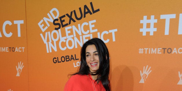 LONDON, ENGLAND - JUNE 12: Amal Alamuddin, Fiance of Actor George Clooney attends the Global Summit to End Sexual Violence in Conflict at ExCel on June 12, 2014 in London, England. The four-day conference on sexual violence in war is hosted by Foreign Secretary William Hague and UN Special Envoy and actress Angelina Jolie. (Photo by Eamonn M. McCormack/Getty Images)