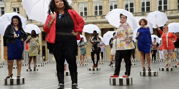 Models present creations for plus-size women by French fashion designer Jean-Marc Philippe on May 16, 2013 at the Palais Royal in Paris. AFP PHOTO / BERTRAND GUAY (Photo credit should read BERTRAND GUAY/AFP/Getty Images)