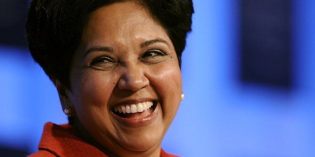 PepsiCo Chairman and CEO Indra Nooyi smiles during a session untitled 'Technology for Society' on the third day of the World Economic Forum (WEF) annual meeting on January 29, 2010 in Davos. Thirty heads of state and government and 2,500 business and academic elite attend the 40th anniversary Davos forum to hammer out ways to fend off new storm clouds hanging over the global economy. AFP PHOTO / FABRICE COFFRINI (Photo credit should read FABRICE COFFRINI/AFP/Getty Images)