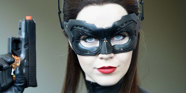 Attendee Genevieve Nylen is dressed as Cat Woman on the third day of the 45th annual Comic-Con, in San Diego, California July 26, 2014 at the San Diego Convention Center . AFP PHOTO / ROBYN BECK (Photo credit should read ROBYN BECK/AFP/Getty Images)