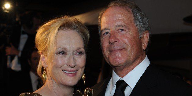 Meryl Streep (L), winner of Best Performance by an Actress in a Leading Role for 'The Iron Lady', and husband Don Gummer arrive at the Governor's Ball after the 84th Annual Academy Awards on February 26, 2012 in Hollywood, California. AFP PHOTO/ Valerie Macon (Photo credit should read VALERIE MACON/AFP/Getty Images)