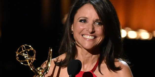 LOS ANGELES, CA - AUGUST 25: Actress Julia Louis-Dreyfus accepts Outstanding Lead Actress in a Comedy Series for 'Veep' onstage at the 66th Annual Primetime Emmy Awards held at Nokia Theatre L.A. Live on August 25, 2014 in Los Angeles, California. (Photo by Kevin Winter/Getty Images)