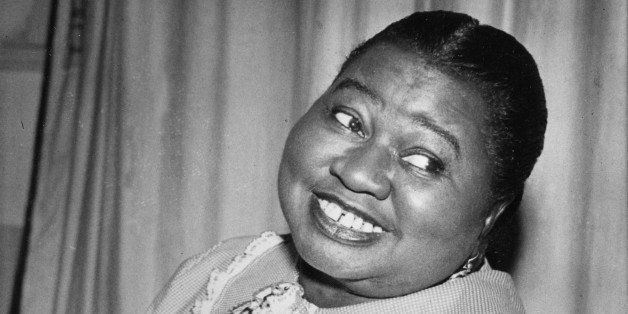 Hattie McDaniel plays a tune as she portrays the title role of "Beulah" in the CBS Radio Network's comedy series in New York City, Aug. 1951. (AP Photo)