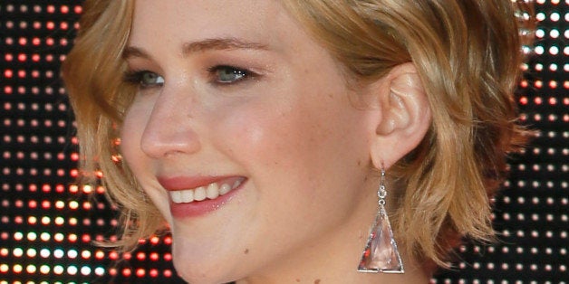 Actress Jennifer Lawrence poses for photographers during a photo call for Hunger Games: Mockingjay Part 1 at the 67th interna