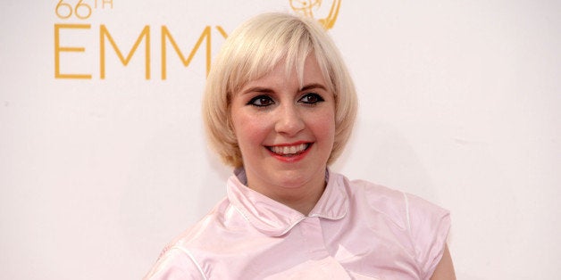 Lena Dunham arrives at the 66th Primetime Emmy Awards at the Nokia Theatre L.A. Live on Monday, Aug. 25, 2014, in Los Angeles