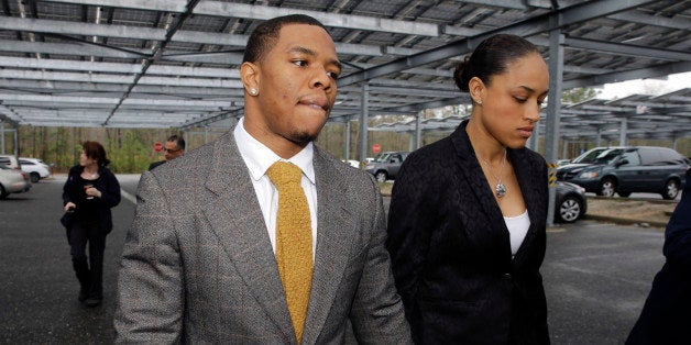 FILE - In this May 1, 2014, file photo, Baltimore Ravens football player Ray Rice holds hands with his wife, Janay Palmer, as they arrive at Atlantic County Criminal Courthouse in Mays Landing, N.J. Banter by two "Fox & Friends" hosts about video showing Rice hitting his then future wife is under fire. The hosts, Brian Kilmeade and Steve Doocey, made their on-air comments Monday, Sept. 8, 2014, while discussing newly released elevator video showing Rice hitting Janay Palmer in February. (AP Photo/Mel Evans, File)