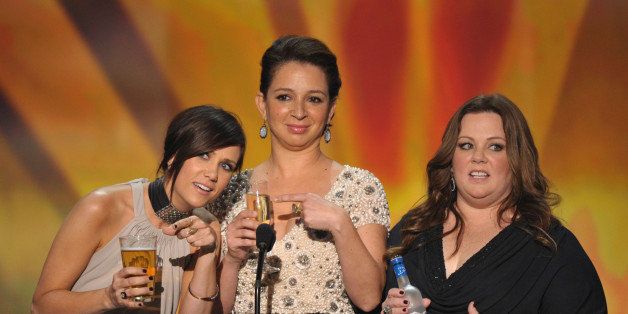 LOS ANGELES, CA - JANUARY 29: (L-R) Actresses Kristen Wiig, Maya Rudolph and Melissa McCarthy speak onstage during The 18th Annual Screen Actors Guild Awards broadcast on TNT/TBS at The Shrine Auditorium on January 29, 2012 in Los Angeles, California. (Photo by John Shearer/WireImage) 22005_009_JS_0392.JPG 