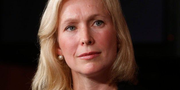 FILE - This July 16, 2013 file photo shows Sen. Kirsten Gillibrand, D-N.Y. listening at a news conference about a bill regarding military sexual assault cases on Capitol Hill in Washington. This week, the Senate is slated to consider an annual defense policy bill that would strip commanders of their ability to overturn jury convictions, require dishonorable discharge or dismissal for any individual convicted of sexual assault and establish a civilian review when a decision is made not to prosecute a case. The bill also would provide a special counsel for victims and eliminate the statute of limitations. (AP Photo/Charles Dharapak, File)