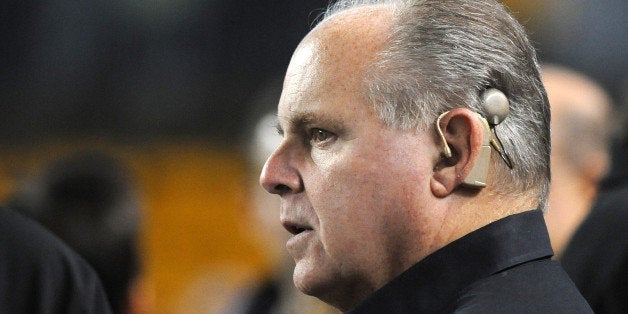 PITTSBURGH - NOVEMBER 14: Radio talk show host and political commentator Rush Limbaugh looks on from the sideline before a National Football League game between the New England Patriots and Pittsburgh Steelers at Heinz Field on November 14, 2010 in Pittsburgh, Pennsylvania. The Patriots defeated the Steelers 39-26. (Photo by George Gojkovich/Getty Images)