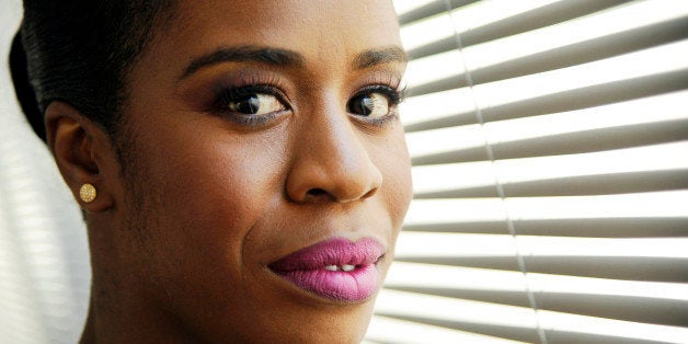 HOLD FOR STORY -- Actress Uzo Aduba, a cast member in the Netflix series "Orange is the New Black," poses for a portrait on Tuesday, July 22, 2014 in Los Angeles. (Photo by Chris PizzelloInvision/AP)