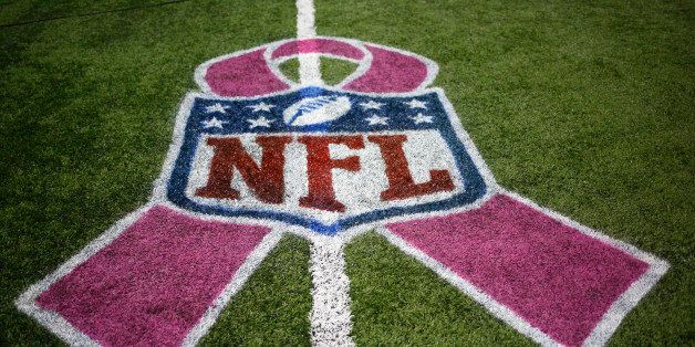 Sunday, Oct. 20, 2013, Breast Cancer Awareness logo on the field before the NFL football game between the Detroit Lions and the Cincinnati Bengals in Detroit. (AP Photo/Rick Osentoski)