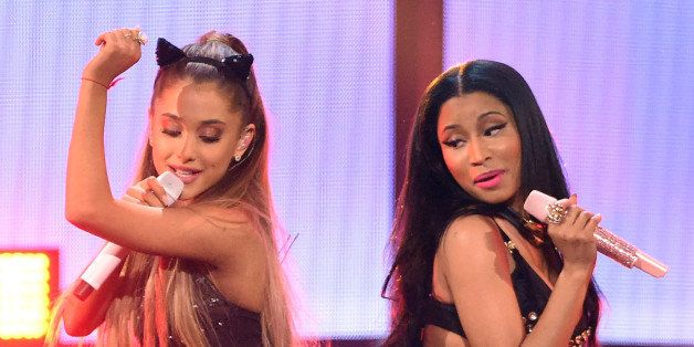LAS VEGAS, NV - SEPTEMBER 19: Recording artists Ariana Grande (L) and Nicki Minaj perform during the 2014 iHeartRadio Music Festival at the MGM Grand Garden Arena on September 19, 2014 in Las Vegas, Nevada. (Photo by Ethan Miller/Getty Images for Clear Channel)