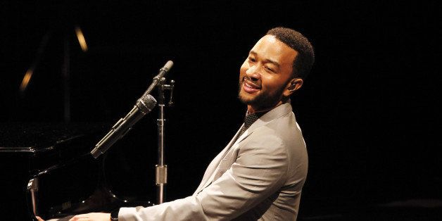 LOS ANGELES, CA - AUGUST 18: John Legend performs at The Greek Theatre on August 18, 2014 in Los Angeles, California. (Photo by Tibrina Hobson/FilmMagic)