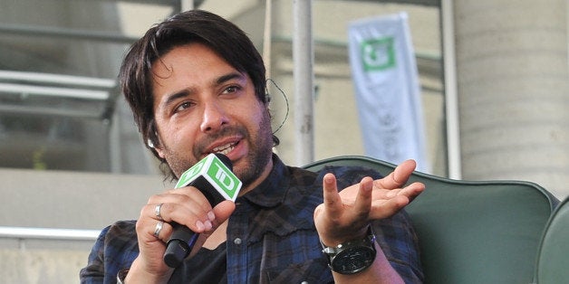 TORONTO, ON - MAY 26: Jian Ghomeshi attends Tegan & Sara And TD Music Come Together at Roy Thomson Hall on May 26, 2014 in