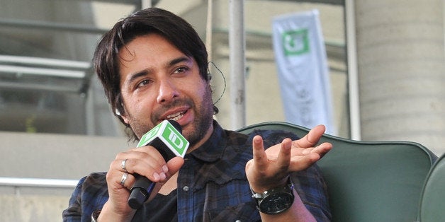 TORONTO, ON - MAY 26: Jian Ghomeshi attends Tegan & Sara And TD Music Come Together at Roy Thomson Hall on May 26, 2014 in Toronto, Canada. (Photo by Sonia Recchia/WireImage)