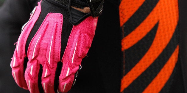 CINCINNATI, OH - OCTOBER 07: Michael Johnson #93 of the Cincinnati Bengals, wears pink gloves for breast cancer awareness du