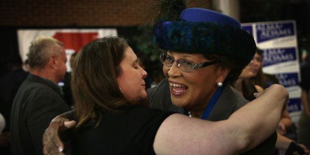 GREENSBORO, NC - NOVEMBER 04: Democratic U.S. House of Representatives-elect Alma Adams (D-NC) (R) is hugged by a supporter after learning of her victory during an election night party for Sen. Kay Hagan November 4, 2014 in Greensboro, North Carolina. Adams had represented North Carolina's 58th district in the state General Assembly since 1994. (Photo by Alex Wong/Getty Images)