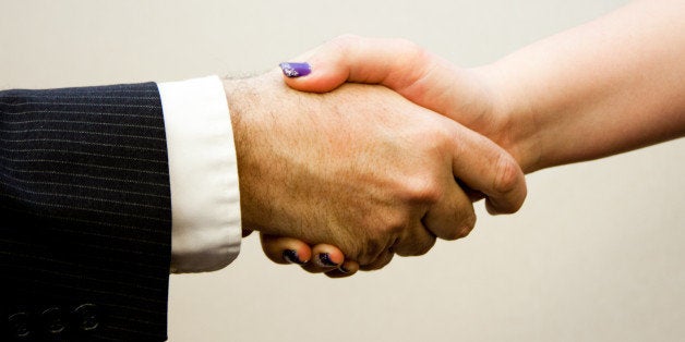 Man and women shaking hands
When using this image please provide photo credit (link) to: <a href="http://www.flazingo.com"