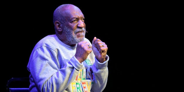 Comedian Bill Cosby performs during a show at the Maxwell C. King Center for the Performing Arts in Melbourne, Fla., Friday, Nov. 21, 2014.(AP Photo/Phelan M. Ebenhack)