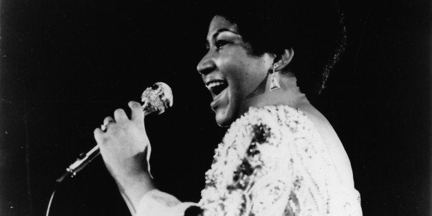 Aretha Franklin performs on stage in 1970 in the United States. (Photo by Gilles Petard/Redferns)