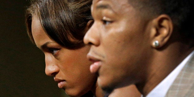 FILE - In this May 23, 2014, file photo, Janay Rice, left, looks on as her husband, Baltimore Ravens running back Ray Rice, speaks during an NFL football news conference at the team's practice facility in Owings Mills, Md. Ray Rice spoke to the media for the first time since his arrest for assaulting his fiance, now his wife, at a casino in Atlantic City, N.J. (AP Photo/Patrick Semansky, File)