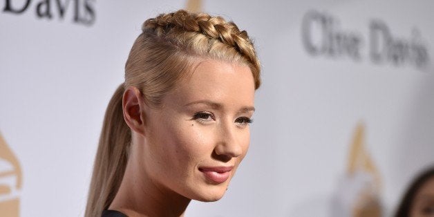 Iggy Azalea arrives at the 2015 Clive Davis Pre-Grammy Gala at the Beverly Hilton Hotel on Saturday, Feb. 7, 2015, in Beverly