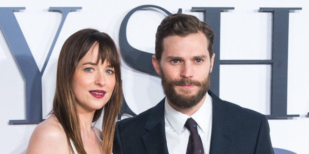 LONDON, ENGLAND - FEBRUARY 12: Jamie Dornan and Dakota Johnson attend the UK Premiere of 'Fifty Shades Of Grey' at Odeon Lei