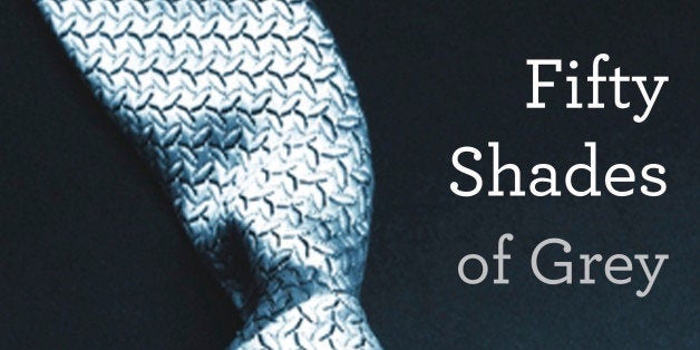 This book cover image provided by Vintage Books shows "Fifty Shades of Grey," by E L James. They're young and old, doctors and churchgoers, gay and straight _ and those are just the MEN who have devoured oh-so-naughty "Fifty Shades of Grey," a violent, erotic trilogy that has earned millions of women fans in a matter of weeks. (AP Photo/Vintage Books)