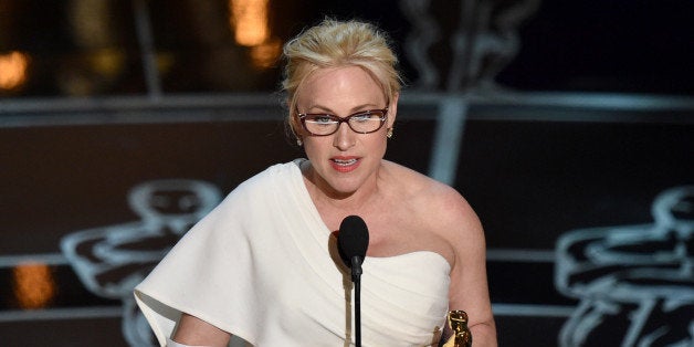 Patricia Arquette accepts the award for best actress in a supporting role for âBoyhoodâ at the Oscars on Sunday, Feb. 22,