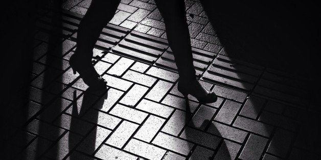 Woman Walking In A Street
