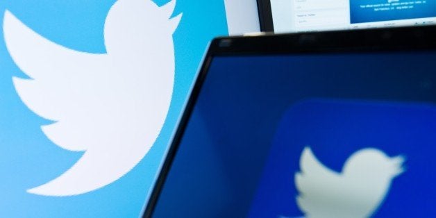 The logo of social networking website 'Twitter' is displayed on a computer screen in London on September 11, 2013. AFP PHOT