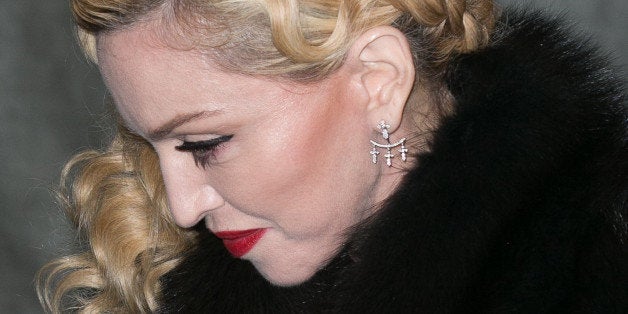 PARIS, FRANCE - MARCH 02: Singer Madonna leaves her hotel on March 2, 2015 in Paris, France. (Photo by Marc Piasecki/GC Ima