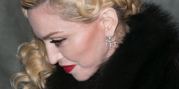 PARIS, FRANCE - MARCH 02: Singer Madonna leaves her hotel on March 2, 2015 in Paris, France. (Photo by Marc Piasecki/GC Images)