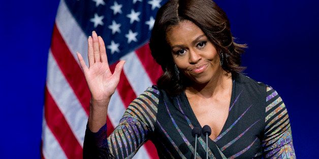 First lady Michelle Obama waves while speaki g at the Newseum in Washington, Wednesday, March 4, 2015, to launch the "Change Direction" campaign. Michelle Obama says mental health care is not just a policy and budget issue for America, but also a cultural issue. The first lady says there should be no stigma around mental health, and the real change requires a shift in "our attitudes." Mrs. Obama spoke Wednesday at a mental health summit and the national launch of the campaign to "Change Direction." (AP Photo/Manuel Balce Ceneta)